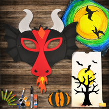 Load image into Gallery viewer, This picture shows The Kids Craft&#39;s The Fiery Dragon Craft Kit and the material included &amp; final product that your kid will be able to create once they are done. This is a Craft Kit Box for 1 crafter.  Let your kid be a creator with this Craft Kit Box - The Kids Craft, a Creativeana LLC company creation. Your kid will love The Kids Craft&#39;s The Fiery Dragon Crafts as they create their own wearable Fiery Dragon, decorate Luminary Bag, decorate a pumpkin, and create their dragon art masterpiece.
