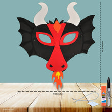 Load image into Gallery viewer, This picture shows The Kids Craft&#39;s The Fiery Dragon Craft - Wearable and the material included &amp; final product that your kid will be able to create once they are done. This is a wearable product.  Let your kid be a creator with this Craft Kit Box - The Kids Craft, a Creativeana LLC company creation. Your kid will love The Kids Craft&#39;s The Fiery Dragon Crafts as they create their own wearable Fiery Dragon, decorate Luminary Bag, decorate a pumpkin, and create their dragon art masterpiece.
